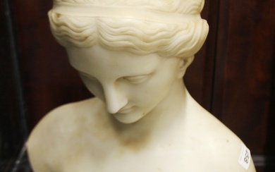 A 19thC carved marble bust of a young woman, H. 54cm.