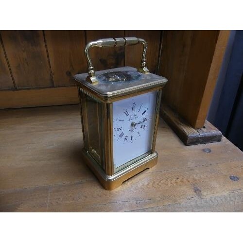 A 20th century French gilt brass Carriage Clock, signed L'Ep...