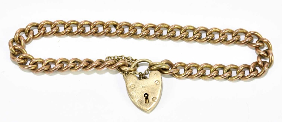 A 9ct rose gold curb link bracelet with padlock clasp,...