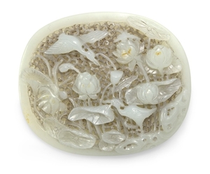 A CELADON JADE RETICULATED PLAQUE QING DYNASTY, 18TH CENTURY