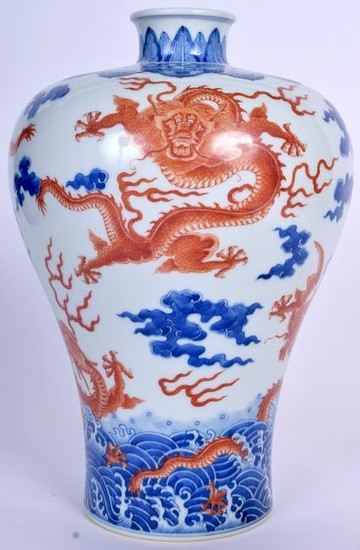 A CHINESE BLUE AND WHITE BALUSTER VASE bearing Qianlong