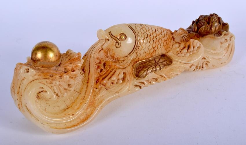 A CHINESE CARVED HARDSTONE RUI SCEPTRE. 20 cm long.