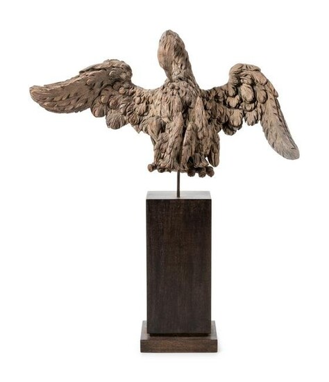 A Carved Wood Model of a Spread-Winged Eagle on an