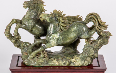 A Chinese Carved Soapstone Equestrian Group