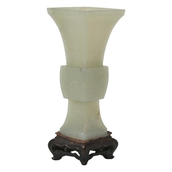 A Chinese Celadon Jade Archaic Beaker Vase
