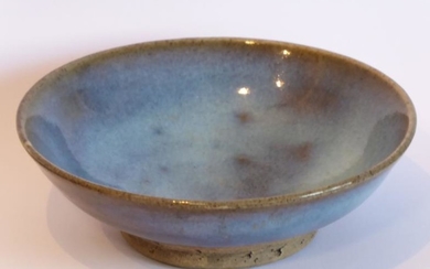 A Chinese Yuan/Ming Junware circular dish; sky-blue glaze raised...