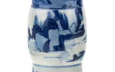 A Chinese blue and white beaker vase, gu, Kangxi period, the grounded vase with a stepped and splayed foot, painted to the exterior with figurative watery landscape scenes, a flower within a triple circle to glazed base, further 15.5cm high 清康熙...