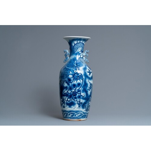 A Chinese blue and white 'dragon' vase, 19th C.Description:H...