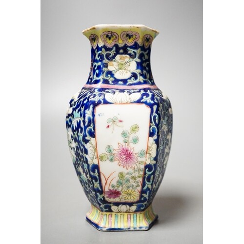 A Chinese blue ground famille rose hexagonal vase, late 19th...