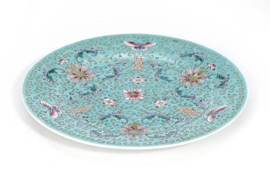 A Chinese enamelled porcelain plate painted with flowers, leaf scroll, butterflies and...