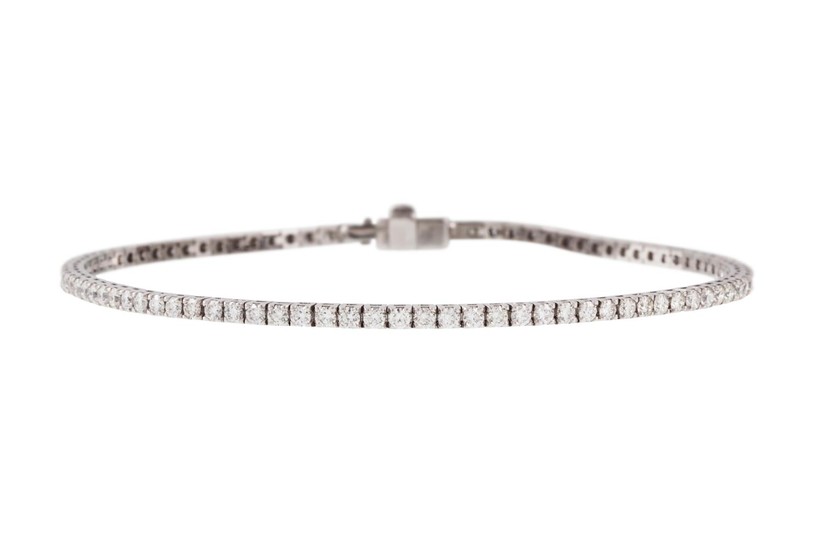 A DIAMOND LINE BRACELET, with diamonds of 2.80ct in total, m...