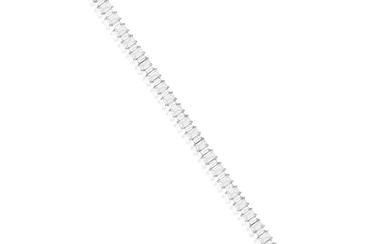 A FINE DIAMOND LINE BRACELET Composed of a continuous line ...