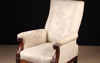A Fine William IV Mahogany Library Chair. The upholstered rectangular back, scroll arms and sprung s