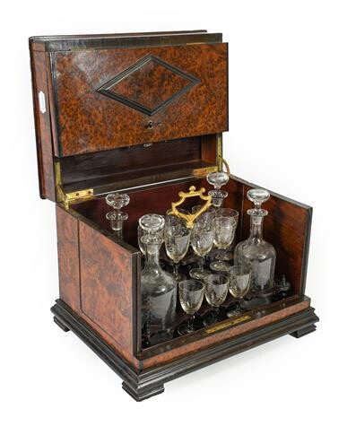 A French Amboyna Travelling Liqueur Set, mid 19th century, of...