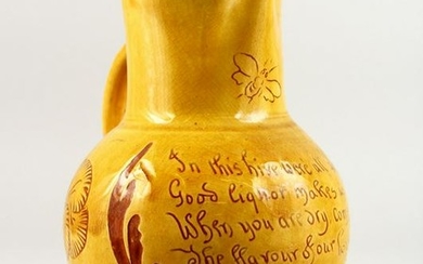 A GOOD YELLOW STONEWARE "BEE" JUG with inscription "In