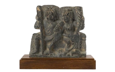 A GREY SCHIST RELIEF FRAGMENT OF HARITI AND PANCHIKA Ancient region of Gandhara, 2nd - 3rd century