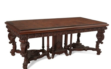 A Horner-style carved wood refectory table