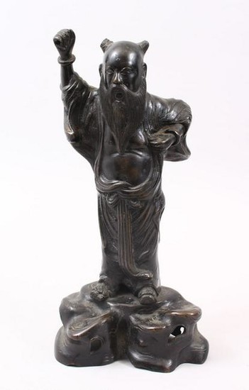A LATE 19TH CENTURY CHINESE BRONZE FIGURE OF AN