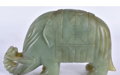 A LATE 19TH CENTURY CHINESE CARVED JADE FIGURE OF AN ELEPHAN...
