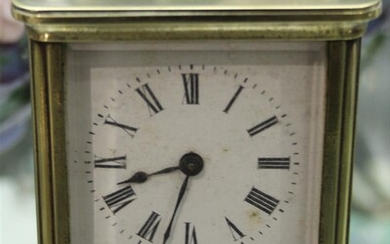 A LATE VICTORIAN TRAVELLING CLOCK