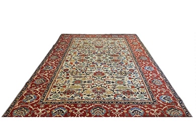 A Large Caucasian Anadol wool carpet, having a cream ground ...
