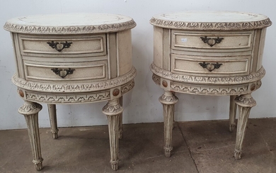 A PAIR OF OVAL FRENCH STYLE BEDSIDE CABINETS
