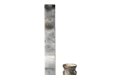A PALE GREEN AND GREY JADE SCROLL WEIGHT AND A...