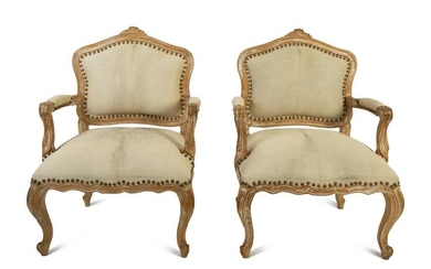A Pair of French Provincial Fauteuils with Hide