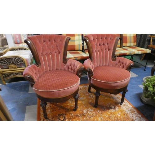 A Pair of Late Victorian Walnut Framed Salon Chairs with But...