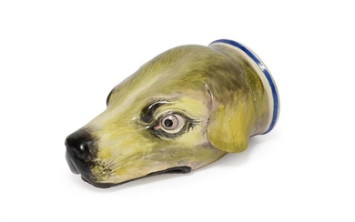 A Pearlware Hound's Head Stirrup Cup, early 19th century, naturalistically...