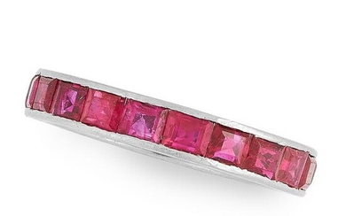 A RUBY ETERNITY RING in platinum, set with a single row