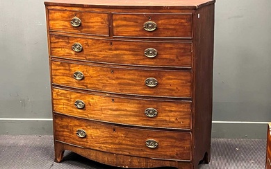 A Regency mahogany bow front chest of two short over four long drawers 114 x 106 x 51cm