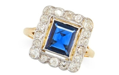 A SAPPHIRE AND DIAMOND RING set with a step cut