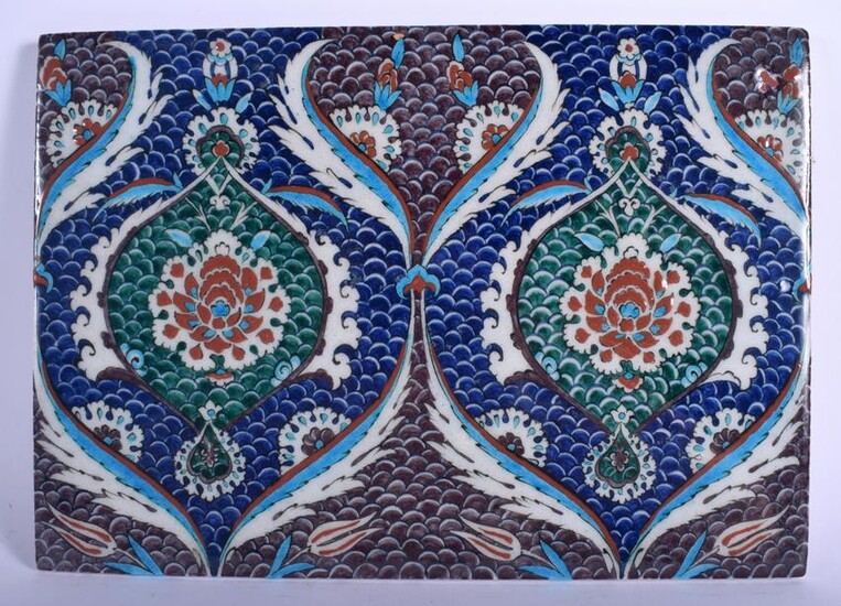 A TURKISH MIDDLE EASTERN FAIENCE GLAZED POTTERY TILE
