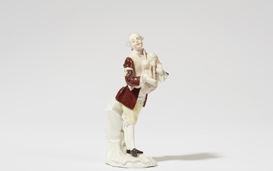 A Vienna porcelain figure of a shepherd with bagpipes