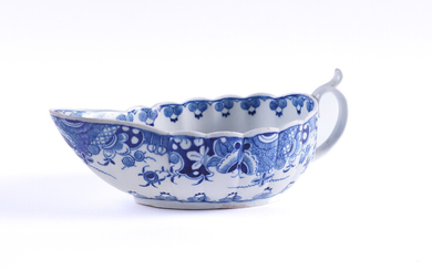 A WORCESTER BLUE AND WHITE OVAL FLUTED SAUCEBOAT