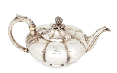 A William IV melon-shaped silver teapot, London, c.1834, Charles Gordon, the bachelor's teapot of lobed form with engraved crest to body and stylised bud finial to hinged lid, 10.5cm high, approx. weight 11.5oz