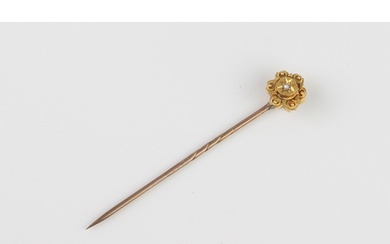 A cased Victorian yellow and rose gold and diamond stick pin...