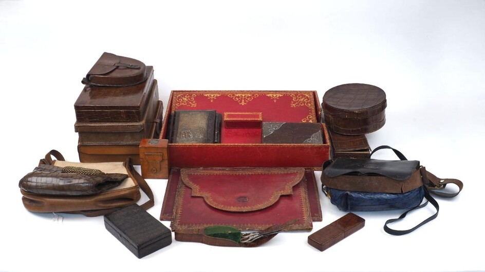 A collection of leather boxes and cases, late 19th/20th century, to include: a red gilt-tooled Asprey stationary box, two further gilt-tooled document folders, a stationary box, c.1920, with some ivory implements, a silver-mounted box with...