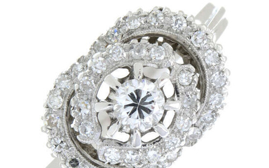 A diamond cluster dress ring.