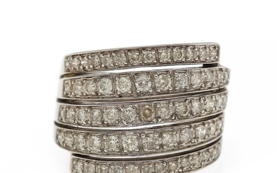 A diamond ring set with numerous brilliant-cut diamonds, mounted in 18k white gold. Size 54.5.