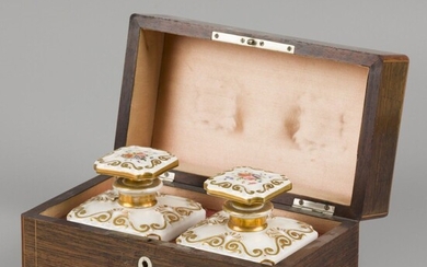 A fruitwood veneered tea caddy, the interior with porcelain flasks, France, 19th century.