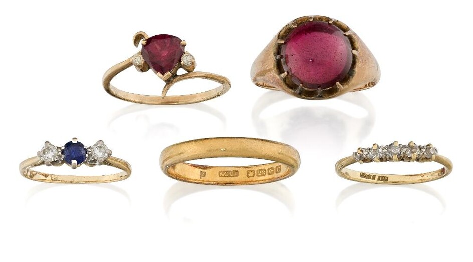 A group of five gold and gem-set rings comprising: a 22ct plain gold band ring, approx. size S, 4.5g; a five-stone diamond ring, hoop stamped 18ct, approx. size L½; a 9ct gold mounted garnet cabochon ring, approx. size Q; a sapphire and diamond...
