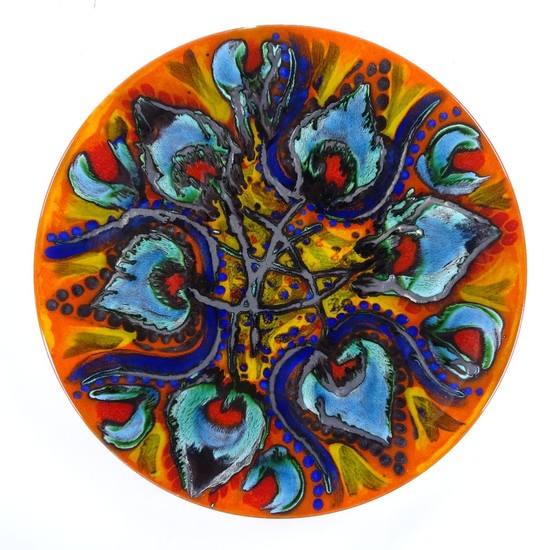 A large Poole Pottery charger with abstract design, by Anita...