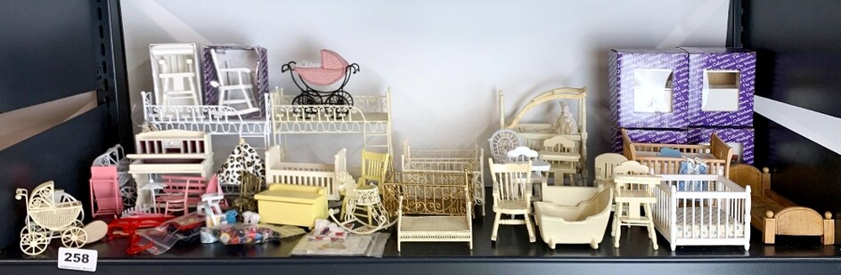 A large quantity of dolls house nursery and children items, including some painted metal and wood furniture items.