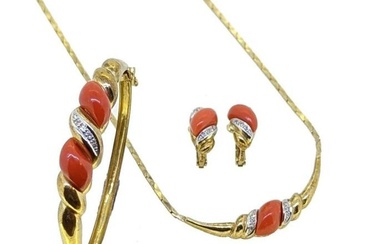 A late 20th century suite of coral jewellery, first, the necklace with cobra style links and a