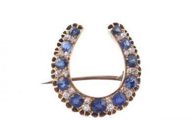 A late Victorian sapphire and diamond horseshoe brooch