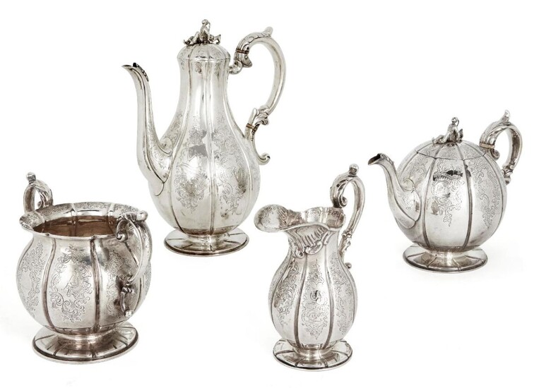 A matched Victorian silver four piece tea service, the tea pot, milk jug and sugar London, 1843, John Angell II & George Angell, the coffee pot Glasgow, 1854, William Clarke Shaw, both pots designed with ivory spacers and novelty finials to hinged...