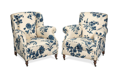A matched pair of easy armchairs
