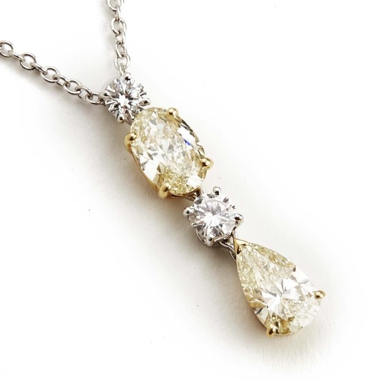 A necklace with a diamond pendant set with oval, pear-shaped and brilliant-cut diamonds weighing a total of app. 2.24 ct., mounted in 18k gold and white gold.